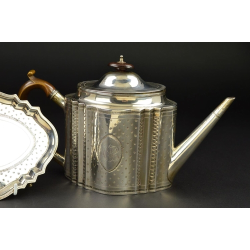 138 - A GEORGE III SILVER TEAPOT AND STAND, of serpentine outline, dome oval hinged cover with fruitwood f... 