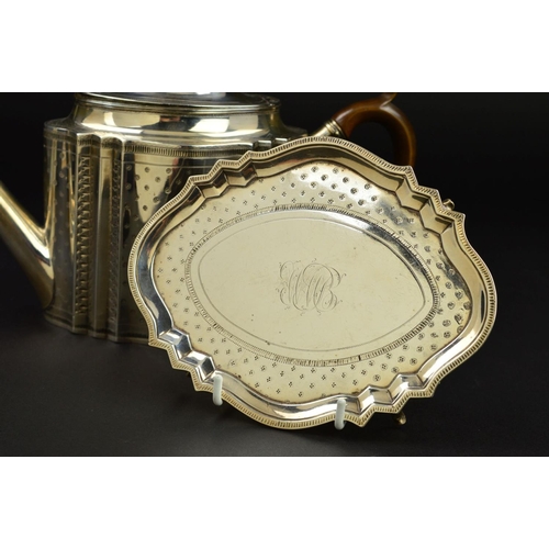 138 - A GEORGE III SILVER TEAPOT AND STAND, of serpentine outline, dome oval hinged cover with fruitwood f... 