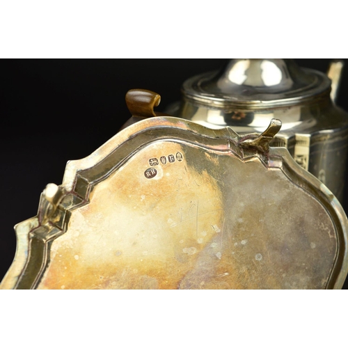 138 - A GEORGE III SILVER TEAPOT AND STAND, of serpentine outline, dome oval hinged cover with fruitwood f... 