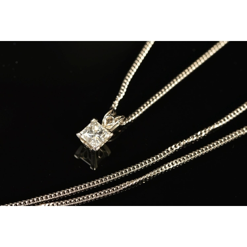 14 - A MODERN PLATINUM SINGLE STONE PRINCESS CUT DIAMOND PENDANT, estimated weight 0.64ct, colour assesse... 