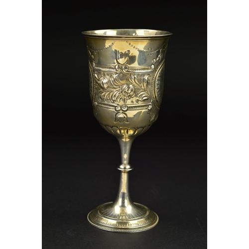 140 - A VICTORIAN SILVER GOBLET, repousse and punched foliate, scroll and swag decoration, beaded foot rim... 