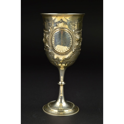 140 - A VICTORIAN SILVER GOBLET, repousse and punched foliate, scroll and swag decoration, beaded foot rim... 