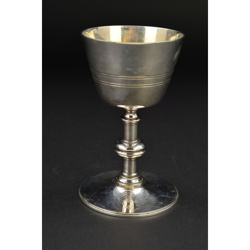 141 - A LATE VICTORIAN SILVER PLATED COMMUNION CHALICE, concentric band decoration, knopped stem, circular... 