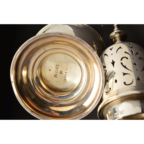 147 - A GEORGE VI SILVER SUGAR CASTER, of baluster form, knop finial above domed pull off cover with folia... 