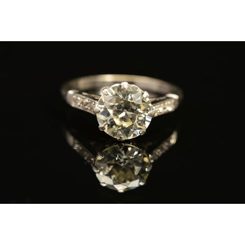 15 - A MID 20TH CENTURY LARGE DIAMOND SINGLE STONE RING, a transitional brilliant cut diamond measuring 9... 