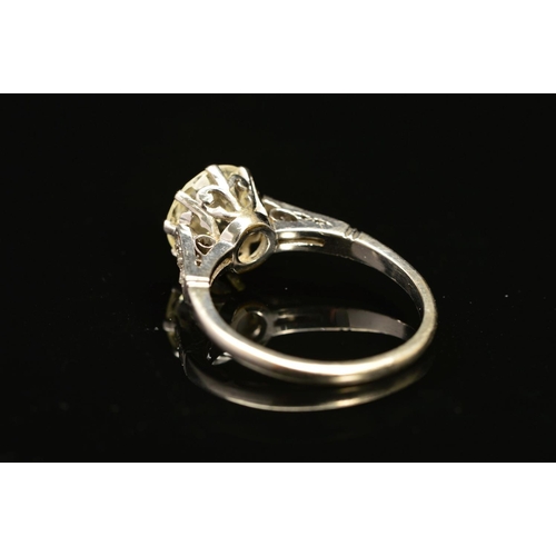 15 - A MID 20TH CENTURY LARGE DIAMOND SINGLE STONE RING, a transitional brilliant cut diamond measuring 9... 