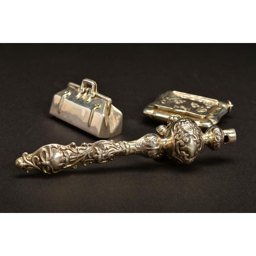 168 - A MODERN SILVER BABY'S RATTLE, of late Victorian style, embossed decoration, with bells and whistle,... 