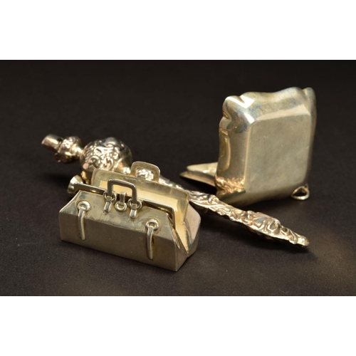 168 - A MODERN SILVER BABY'S RATTLE, of late Victorian style, embossed decoration, with bells and whistle,... 