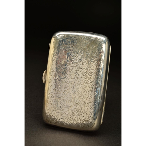 178 - A GEORGE V SILVER RECTANGULAR CIGAR CASE, rounded corners and bowed back, foliate scroll decoration,... 