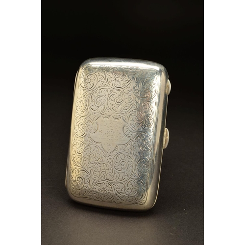 178 - A GEORGE V SILVER RECTANGULAR CIGAR CASE, rounded corners and bowed back, foliate scroll decoration,... 