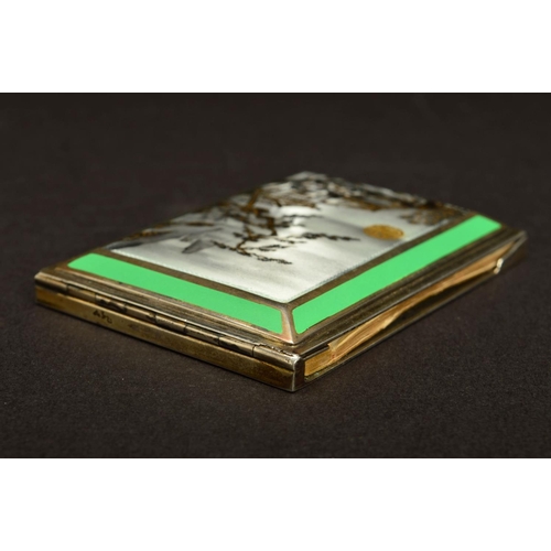 181 - A GEORGE V SILVER AND ENAMEL AIDE MEMOIRE, of rectangular form, the hinged cover enamelled with a Ja... 