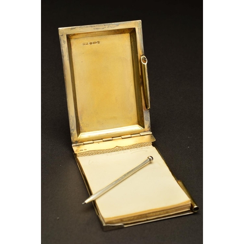 181 - A GEORGE V SILVER AND ENAMEL AIDE MEMOIRE, of rectangular form, the hinged cover enamelled with a Ja... 