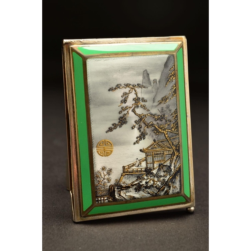 181 - A GEORGE V SILVER AND ENAMEL AIDE MEMOIRE, of rectangular form, the hinged cover enamelled with a Ja... 