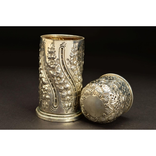 184 - A VICTORIAN SILVER SUGAR CASTER, of cylindrical form, domed pull off cover, foliate repousse decorat... 