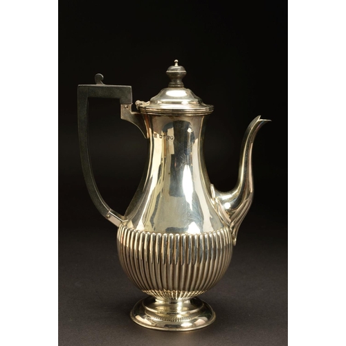 186 - A VICTORIAN SILVER COFFEE POT, of baluster form, domed cover with ebony finial and handle, reeded to... 