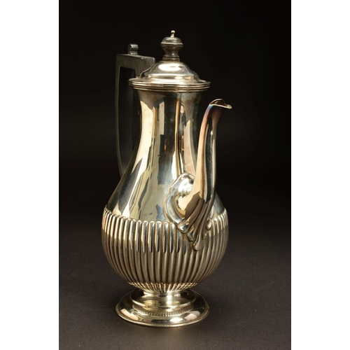 186 - A VICTORIAN SILVER COFFEE POT, of baluster form, domed cover with ebony finial and handle, reeded to... 