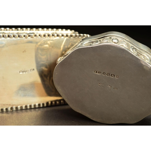 190 - A LATE 19TH CENTURY CONTINENTAL SILVER BOX, of shaped oval form, the hinged cover embossed with a si... 