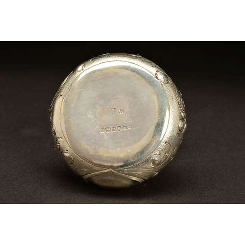 191 - A LATE 19TH CENTURY CONTINENTAL SILVER TRINKET BOX, of circular form, the hinged cover repousse deco... 