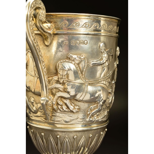 199 - A VICTORIAN SILVER TWIN HANDLED TROPHY CUP, decorated with an engraved band of rolling waves above a... 