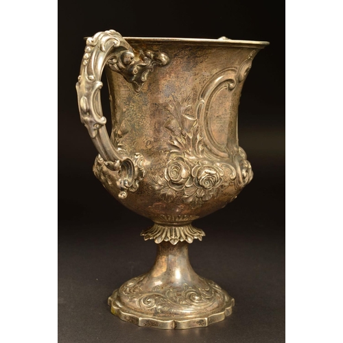 200 - A VICTORIAN SILVER TWIN HANDLED TROPHY CUP, of urn form, repousse decorated with roses and thistles,... 