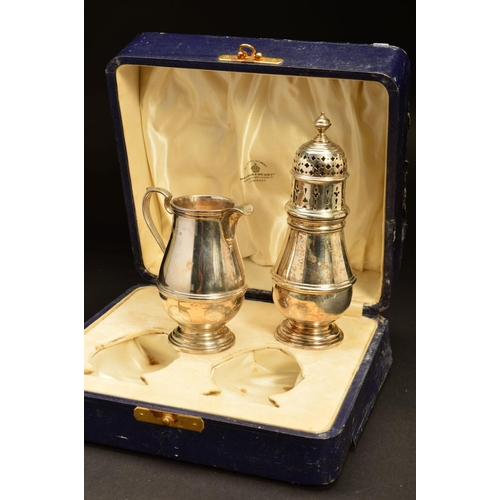 205 - A GEORGE V CASED SILVER MAPPIN & WEBB SILVER CREAM JUG AND SUGAR CASTER, both of girdled baluster fo... 