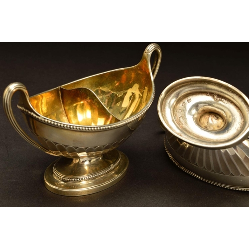 211 - A PAIR OF GEORGE III SILVER DIVIDED TWIN HANDLED SALTS, of oval form, beaded rims, gilt interiors, p... 