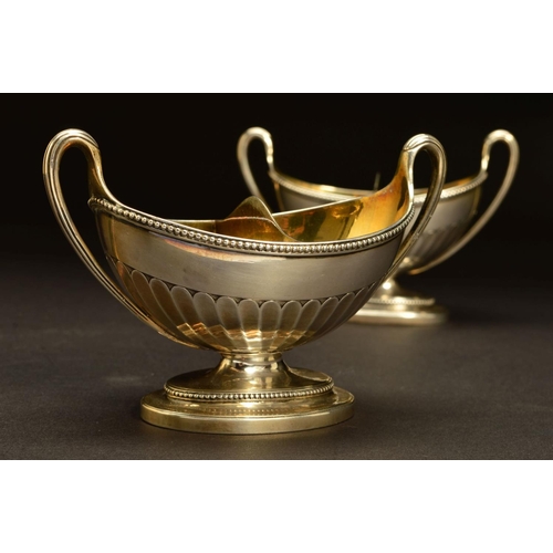 211 - A PAIR OF GEORGE III SILVER DIVIDED TWIN HANDLED SALTS, of oval form, beaded rims, gilt interiors, p... 