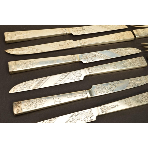 214 - A SET OF SIX VICTORIAN SILVER AESTHETIC STYLE DESSERT KNIVES AND FORKS, engraved foliate decoration ... 