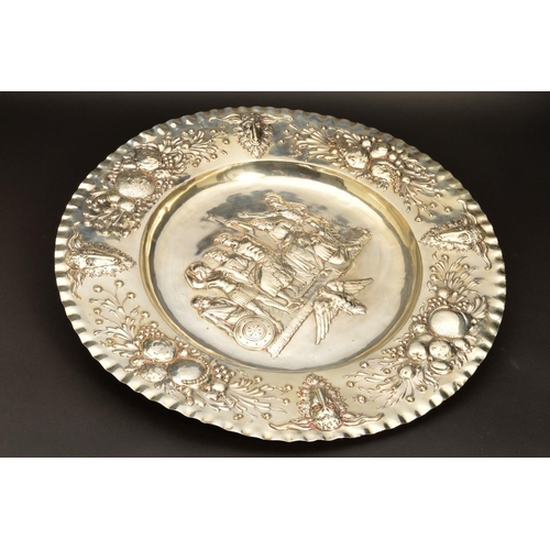 215 - A LATE 19TH/EARLY 20TH CENTURY HANAU SILVER CHARGER, crimped rim, the border embossed with alternati... 