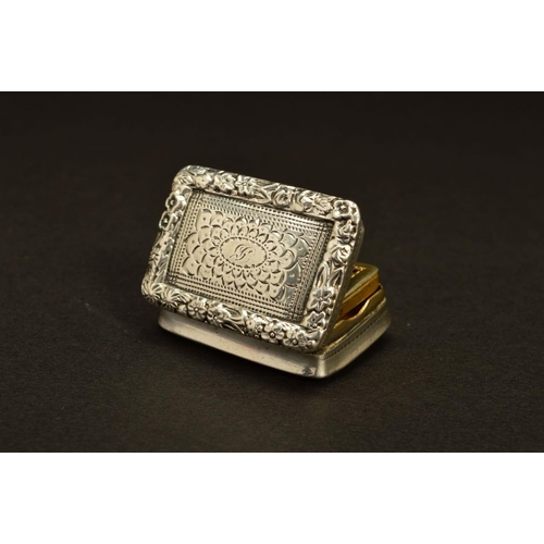 231 - A GEORGE IV SILVER RECTANGULAR VINAIGRETTE BY NATHANIEL MILLS, foliate border surrounding pin prick ... 