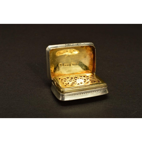 231 - A GEORGE IV SILVER RECTANGULAR VINAIGRETTE BY NATHANIEL MILLS, foliate border surrounding pin prick ... 