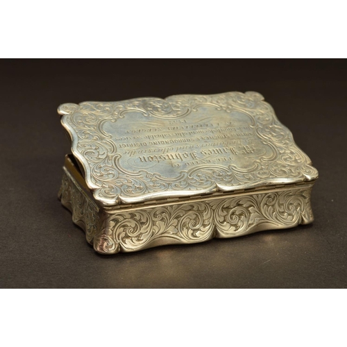 232 - A VICTORIAN SILVER SNUFF BOX, of shaped rectangular form, foliate engraved decoration throughout wit... 