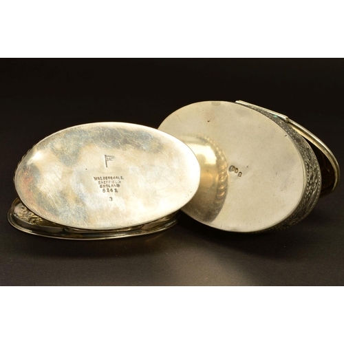 233 - AN EDWARDIAN SILVER OVAL TRINKET BOX, the hinged cover repousse decorated with side profile of a lad... 