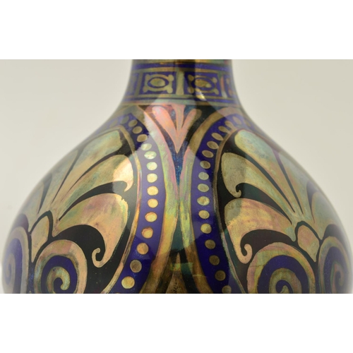 237 - A PILKINGTONS ROYAL LANCASTRIAN POTTERY LUSTRE ONION SHAPED VASE, decorated with silver lustre and b... 