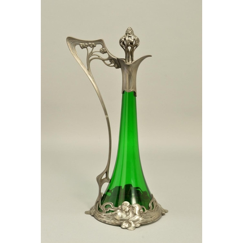 257 - AN ART NOUVEAU WMF (ATTRIBUTED) CLARET JUG, the conical green glass body with openwork stopper and h... 