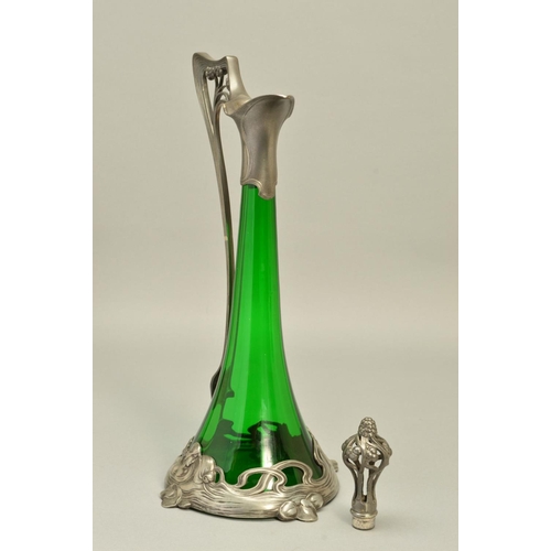 257 - AN ART NOUVEAU WMF (ATTRIBUTED) CLARET JUG, the conical green glass body with openwork stopper and h... 