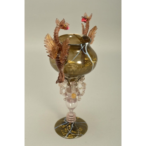 271 - AN ORNATE FACON DE VENISE STYLE GLASS GOBLET, the bowl having gold leaf and white whiplash decoratio... 