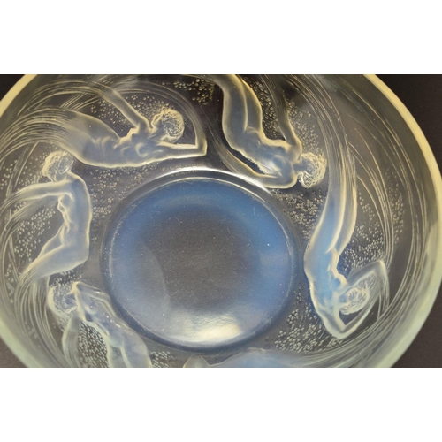 274 - RENE LALIQUE (1860-1945), a circular opalescent bowl in the Ondines pattern, the exterior has relief... 