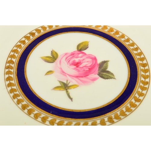 278 - A CAULDON CHINA PART DESSERT SERVICE, hand painted roses to the centres surrounded by bands of gilt ... 