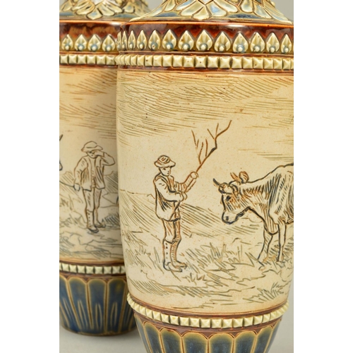 281 - A PAIR OF DOULTON LAMBETH STONEWARE HANNAH BARLOW BALUSTER VASES, the central band incised with a co... 