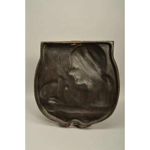 293 - AN EARLY 20TH CENTURY ERNST WAHLISS ART NOUVEAU POTTERY PLAQUE, moulded in relief with a portrait of... 