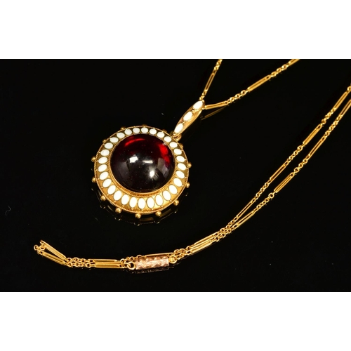 37 - A MID VICTORIAN GOLD GARNET AND WHITE ENAMEL PENDANT, centring on a large cabochon circular garnet m... 