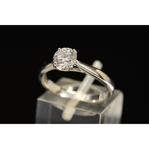 39 - A MODERN PLATINUM DIAMOND SINGLE STONE RING, a modern round brilliant cut diamond, together with a d... 