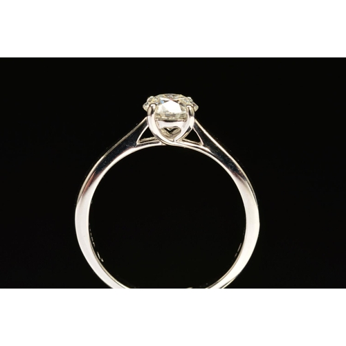 39 - A MODERN PLATINUM DIAMOND SINGLE STONE RING, a modern round brilliant cut diamond, together with a d... 