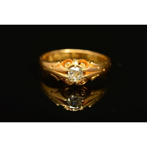 42 - A MID VICTORIAN 18CT GOLD SINGLE STONE DIAMOND RING, set with an old cut diamond to the scrolling ga... 