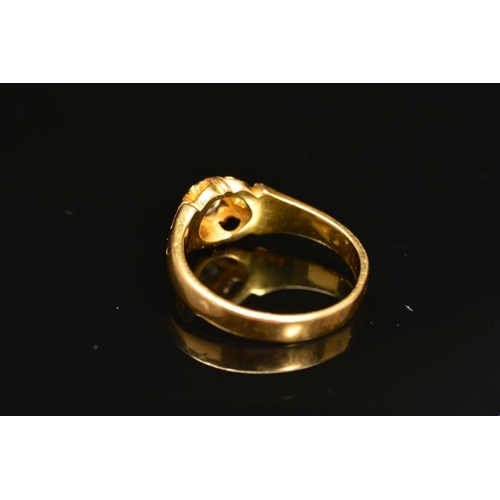 42 - A MID VICTORIAN 18CT GOLD SINGLE STONE DIAMOND RING, set with an old cut diamond to the scrolling ga... 