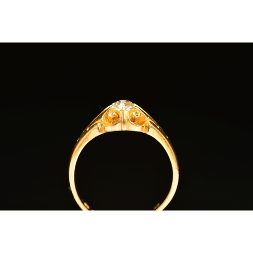 42 - A MID VICTORIAN 18CT GOLD SINGLE STONE DIAMOND RING, set with an old cut diamond to the scrolling ga... 