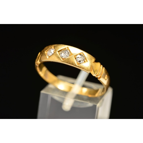 43 - A LATE VICTORIAN 18CT GOLD THREE STONE DIAMOND RING, designed as three old cut diamonds claw set wit... 