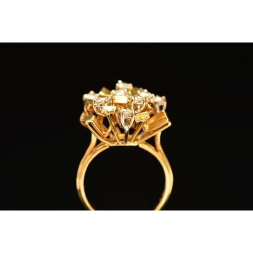 45 - A 1970'S 18CT GOLD ABSTRACT DIAMOND SET RING, designed as spokes claw set with brilliant cut diamond... 