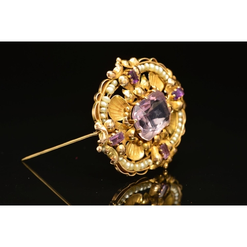 47 - A GOLD AMETHYST AND SEED PEARL BROOCH, the central rectangular amethyst, surrounded by shell and fol... 